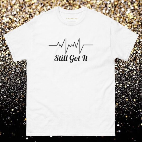 A white t-shirt with the words " still got it ".